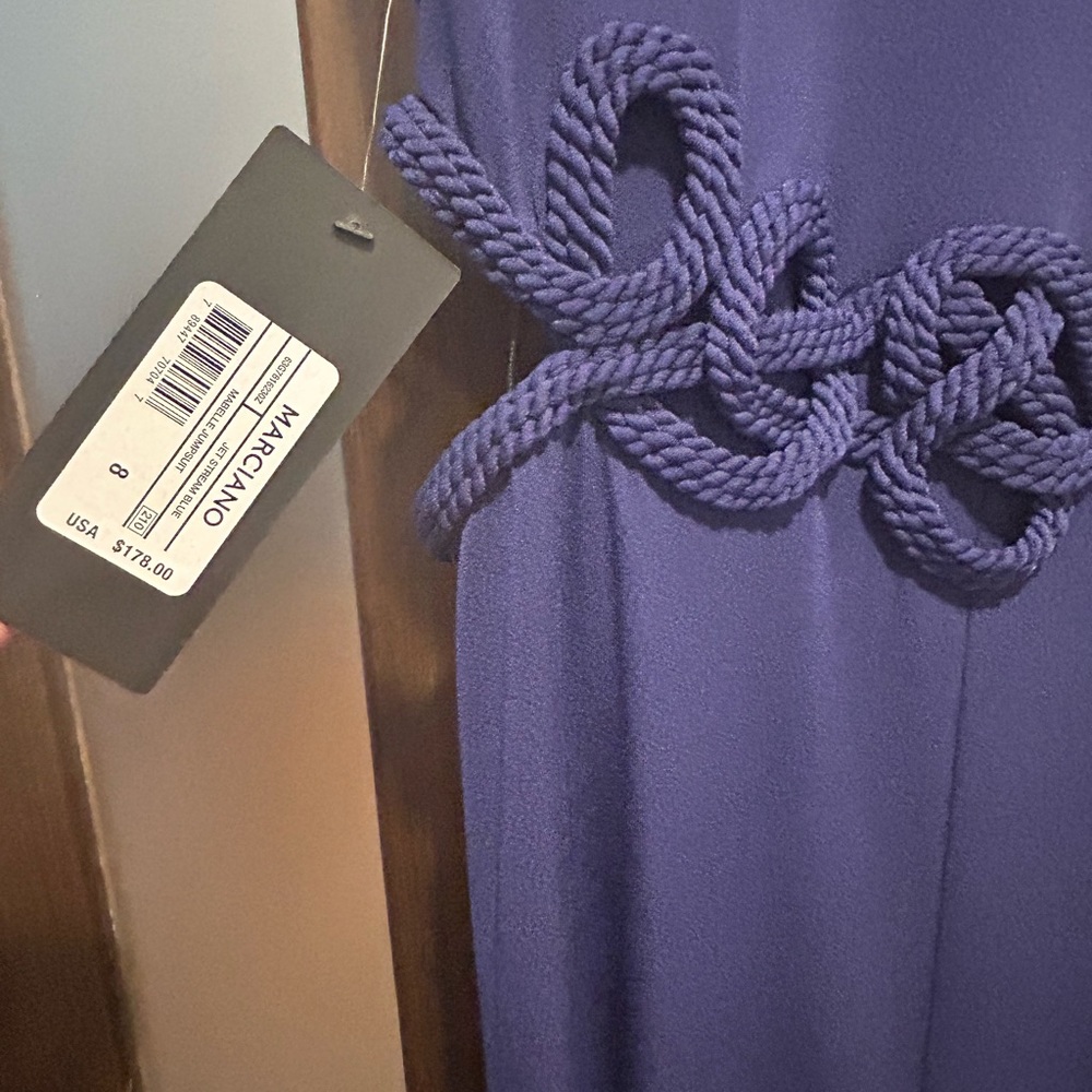 Marciano jump suit, new with tags ,size 8